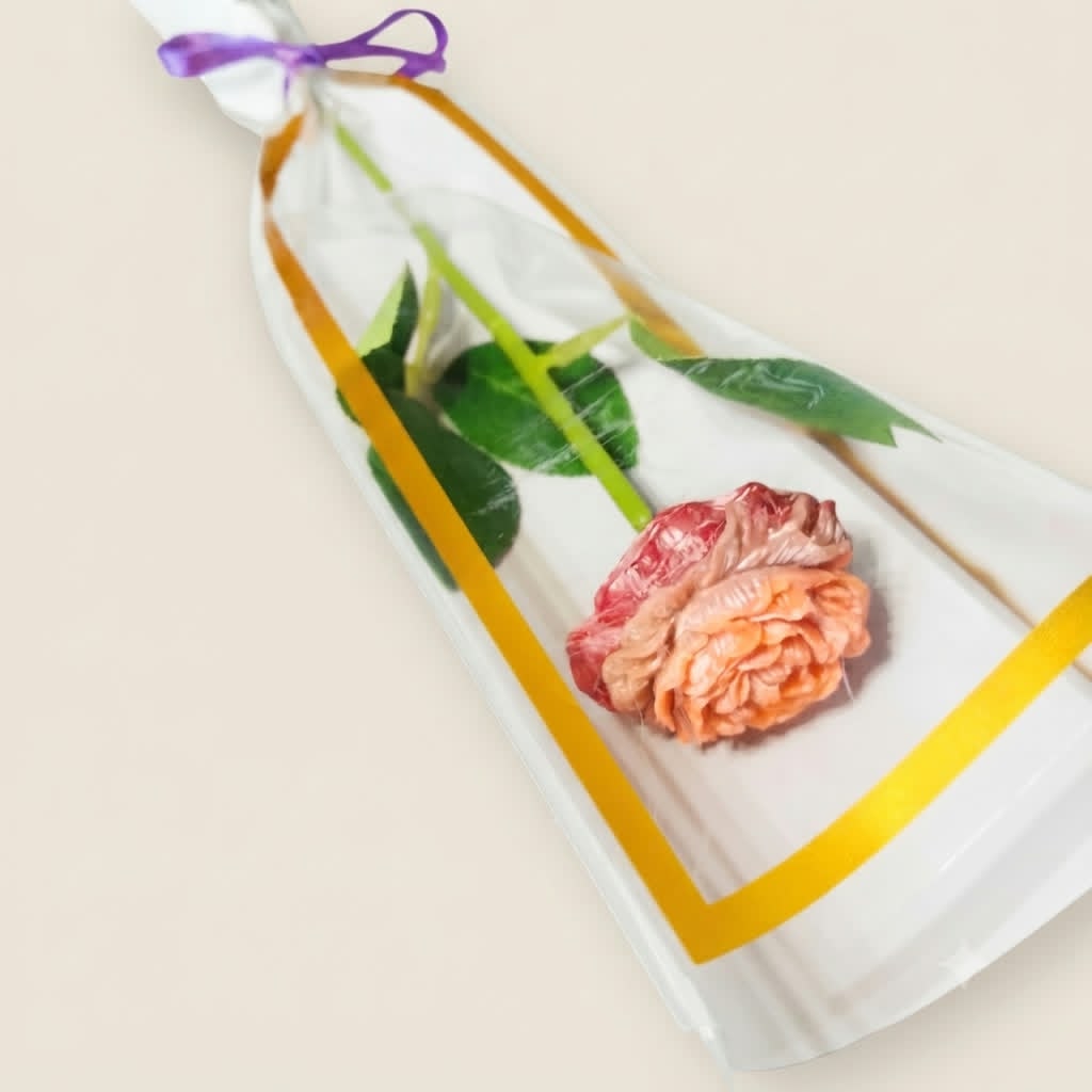 fleur en cire de 13g avec  sa tige en plastique et son joli emballage